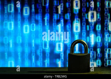 closed padlock in front of blue floating binary code background. cyber and computer security concept. privacy protection against hackers, virus and sp Stock Photo