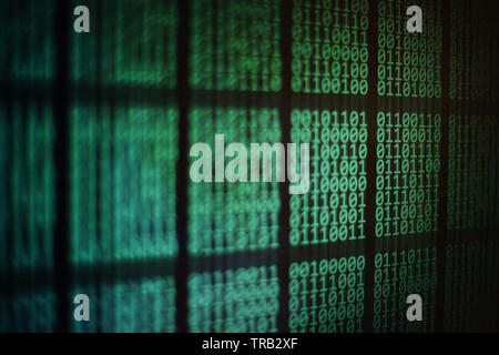 computer monitor displaying binary code. block of data on computer led panel screen. Blockchain, password, personal information, privacy and data tran Stock Photo