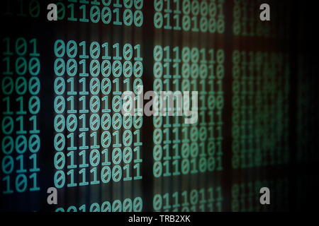 computer monitor displaying binary code. block of data on computer led panel screen. Blockchain, password, personal information, privacy and data tran Stock Photo