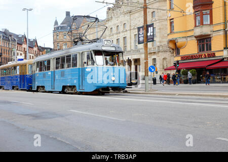 Stockholm, Sweden - April 22, 2019: A vintage blue tram at Nybroplan in service on line 7N with destination Skansen. Stock Photo