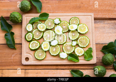 background texture nature kaffir lime slice arrangement  flat lay style on block chopping Stock Photo