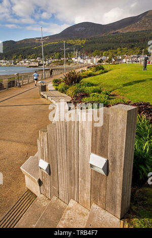 Northern Ireland, Co Down, Newcastle, seafront, wooden edging beside promenade path Stock Photo