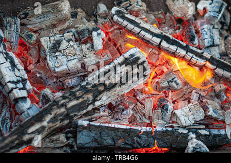 Top view on logs burning in metal oven Stock Photo