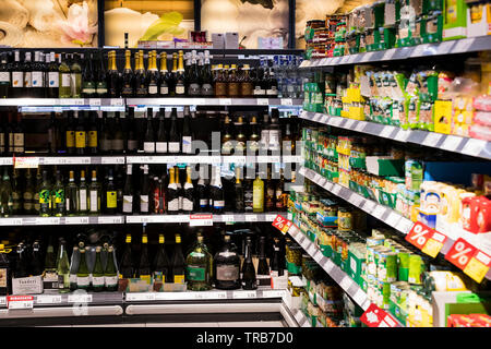 MILAN, ITALY - 2 JUNE, 2018: Grocery shelves interior of the popular in Italy grocery Penny Market Express. Stock Photo