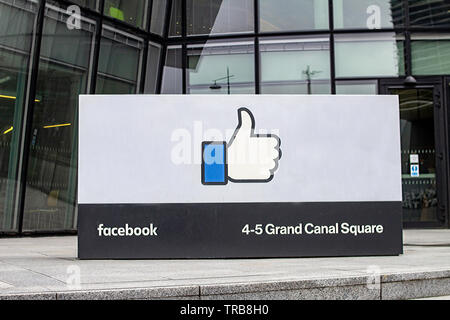 The Facebook logo outside their  offices in Grand Canal Square, Dublin, Ireland. Stock Photo