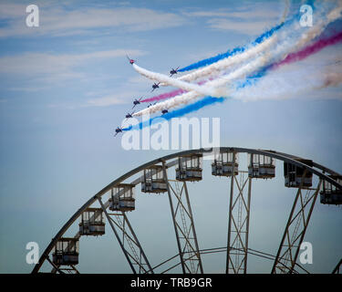 GB - DEVON: RAF Red Arrows Display Team at the Torbay Airshow flying over English Riviera Wheel at Torquay (31. May 2019)