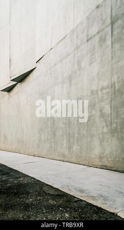 Empty grunge wall with a white path. Stock Photo