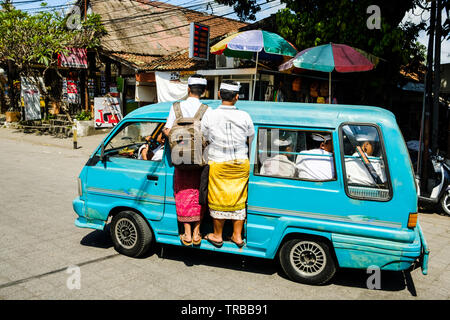 Balinese School Children Squeezed into a Van, Ubud, Bali Stock Photo