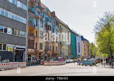 BERLIN, GERMANY - APRIL 18, 2019: People walk along Oberbaum street in Kreuzberg district. Berlin is the capital and largest city of Germany by both a Stock Photo