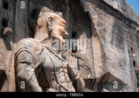 A large bodhisattvas stone statue Fengxiansi cave at Longmen grottoes in Luoyang China Henan province. Stock Photo