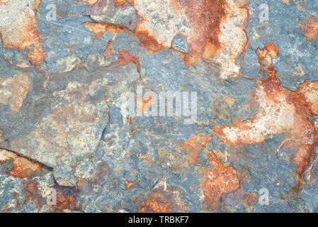 Weathered Rock Textured and Multi Colored Stock Photo