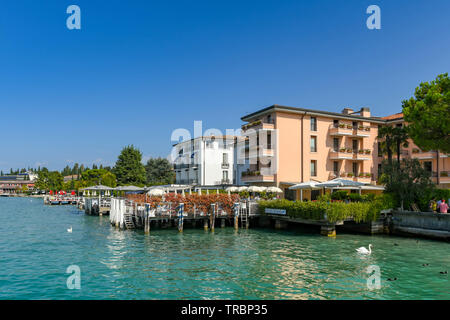 SIRMIONE, LAKE GARDA, ITALY - SEPTEMBER 2018: Hotels on the waterfront at Sirmione on Lake Garda.