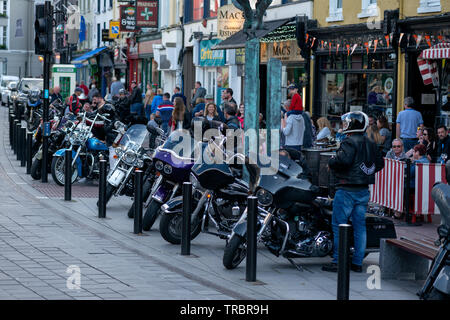 Harley Davidson motorbikes on Main Street at Reidy's bar as the most popular bikers' spot in Killarney, County Kerry, Ireland Stock Photo