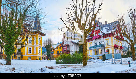 Enjoy the scenic winter garden in Kurhausstrasse, surrounded by traditional historical mansions, Bad Ischl, Salzkammergut, Austria Stock Photo