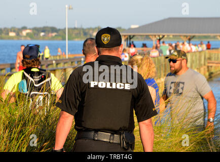 Melbourne Beach, Florida, USA. June 2, 2019 Founded in 1985 this year marks the 34th year of the Rotary Pineapple Man Triathlon.  It is the oldest USA Triathlon (USAT) sanctioned triathlon in the State of Florida. This year the number athletes was limited to around three hundred as the race has grown over the years and overwhelmed the local community. Racers completed a 0.34 mile swim in the Indian River, 15.4 miles bike ride and run the final leg of 03.4 through local streets. Photo Credit Julian Leek / Alamy Live News Stock Photo