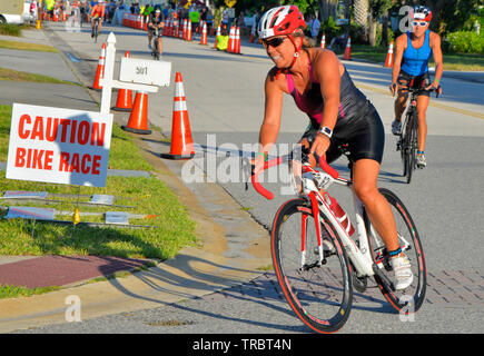 Melbourne Beach, Florida, USA. June 2, 2019 Founded in 1985 this year marks the 34th year of the Rotary Pineapple Man Triathlon.  It is the oldest USA Triathlon (USAT) sanctioned triathlon in the State of Florida. This year the number athletes was limited to around three hundred as the race has grown over the years and overwhelmed the local community. Racers completed a 0.34 mile swim in the Indian River, 15.4 miles bike ride and run the final leg of 03.4 through local streets. Photo Credit Julian Leek / Alamy Live News Stock Photo