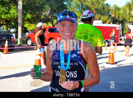 Melbourne Beach, Florida, USA. June 2, 2019 Founded in 1985 this year marks the 34th year of the Rotary Pineapple Man Triathlon.  It is the oldest USA Triathlon (USAT) sanctioned triathlon in the State of Florida. This year the number athletes was limited to around three hundred as the race has grown over the years and overwhelmed the local community. Racers completed a 0.34 mile swim in the Indian River, 15.4 miles bike ride and run the final leg of 03.4 through local streets. Photo Credit Julian Leek / Alamy Live News Stock Photo