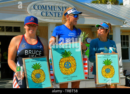 Melbourne Beach, Florida, USA. June 2, 2019 Founded in 1985 this year marks the 34th year of the Rotary Pineapple Man Triathlon.  It is the oldest USA Triathlon (USAT) sanctioned triathlon in the State of Florida. This year the number athletes was limited to around three hundred as the race has grown over the years and overwhelmed the local community. Racers completed a 0.34 mile swim in the Indian River, 15.4 miles bike ride and run the final leg of 03.4 through local streets. Photo Credit Julian Leek / Alamy Live News Stock Photo