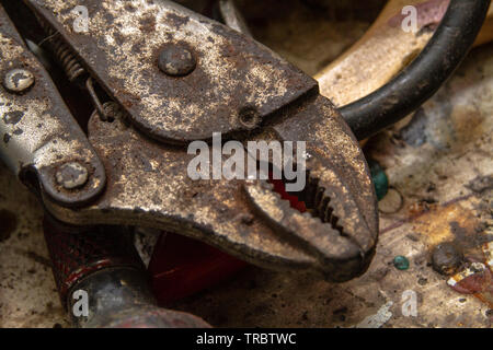 A rusty adjustable hand grip pliers Stock Photo