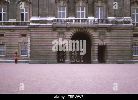 LONDON, ENGLAND - Circa 1967: A view of the Queen's Guard near Buckingham Palace Stock Photo