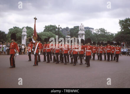 LONDON, ENGLAND - Circa 1967: A view of the Queen's Guard near Buckingham Palace Stock Photo