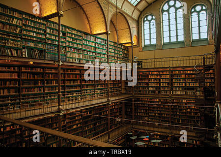 Large library of the Rijksmuseum (National Museum) in Amsterdam. City with huge cultural activity, canals and bridges in Netherlands. Stock Photo