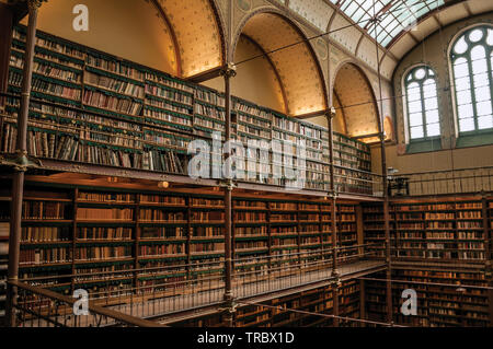 Large library of the Rijksmuseum (National Museum) in Amsterdam. City with huge cultural activity, canals and bridges in Netherlands. Stock Photo