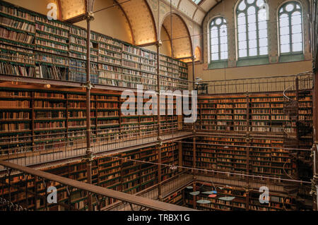 Large library of the Rijksmuseum (National Museum) in Amsterdam. City with huge cultural activity, canals and bridges in Netherlands. Stock Photo