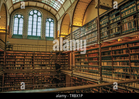 Large library of the Rijksmuseum (National Museum) in Amsterdam. City with huge cultural activity, canals and bridges in Netherlands. Stock Photo