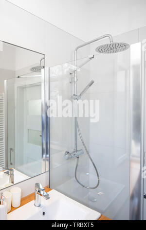 Modern bathroom equipment, details. Wise elegant solutions. White key. Stock Photo