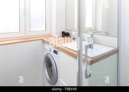 Modern bathroom equipment, details. Wise elegant solutions. White key. Stock Photo