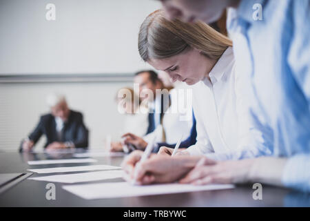 Business people working with documents in conference room Stock Photo