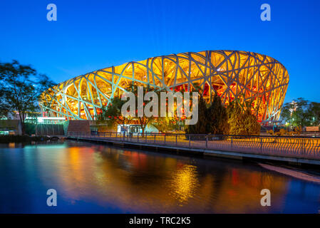 Beijing, China - May 6, 2019: Night view of Beijing National Stadium, also known as the Bird's Nest, designed for use throughout the 2008 Summer Olymp Stock Photo