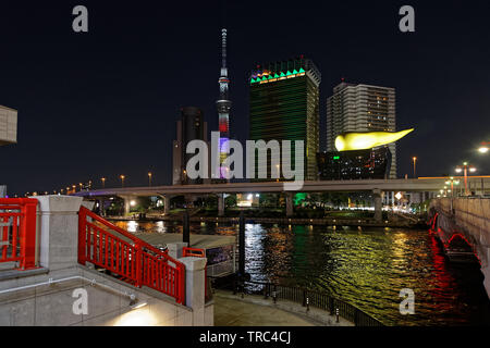 TOKYO, JAPAN, May 11, 2019 : Sumida river banks by night. The Greater Tokyo Area ranked as the most populous metropolitan area in the world. Stock Photo