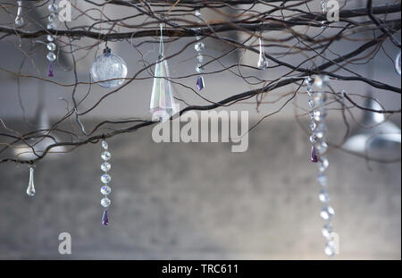 Decoration of the lamp with transparent glass beads and branches Stock Photo