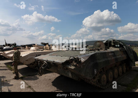 BUDAPEST/HUNGARY - 05.18, 2019: Vintage soviet BMP-1 armored infantry fighting vehicles on display at a defense show. Bright summer day with blue sky. Stock Photo