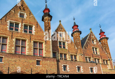 Canal side exterior view of Landhuis van het Brugse Vrije (Palace of the Liberty of Bruges) in Bruges, Belgium. Cityscape of Bruges streets Stock Photo