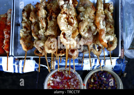 Photo of assorted deep fried chicken innards on display at a food cart Stock Photo