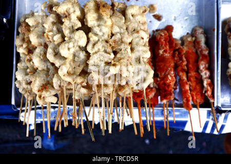 Photo of assorted deep fried chicken innards on display at a food cart Stock Photo