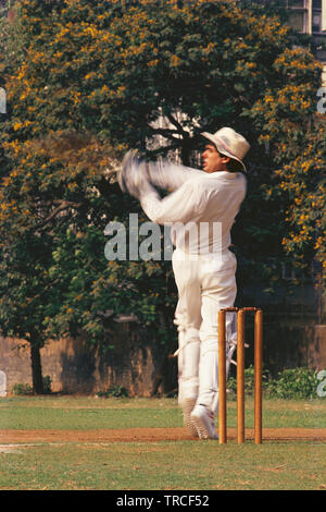 A BATSMAN PLAYING THE HOOK SHOT IN A CRICKET MATCH Stock Photo