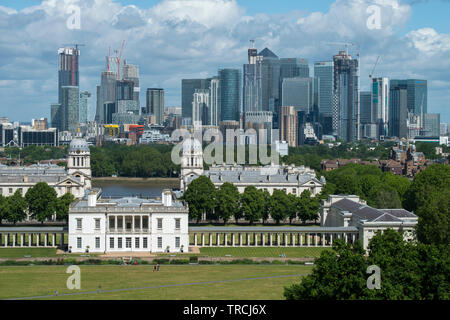 London England UK. Canary Wharf and Queen's House Greenwich photographed from Greenwich Park in South East London. May 2019 Stock Photo