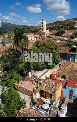 Colorful skyline with mountains and colonial houses. The village is a Unesco World Heritage and major tourist landmark on the Caribbean Island, Trinid Stock Photo