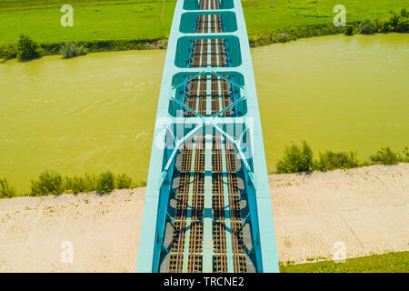 Green Railway bridge over Sava river in Zagreb, Croatia, from drone, aerial view Stock Photo