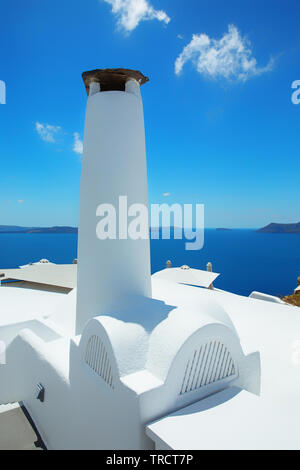 Chimney stack on a white adobe home in Santorini, Greece. Stock Photo