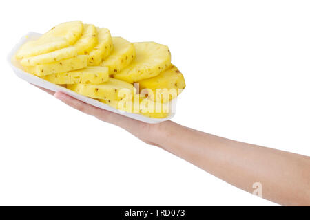 healthy eating, dieting, vegetarian food and people concept- close up of women hands holding pineapple slices isolated on white background Stock Photo