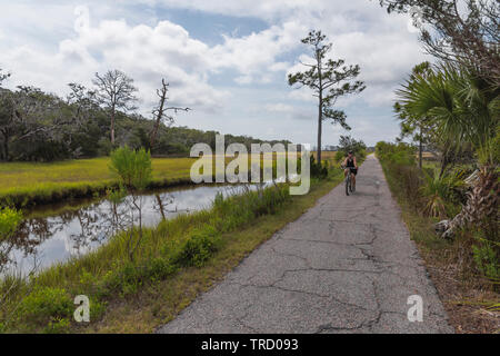 Bicycle riding on Jekyll Island Bike trails Brunswick, Georgia USA Stock Photo