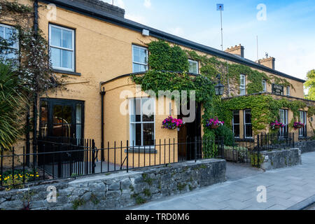 Dunraven Arms Hotel in Adare, Ireland - Considered One of Ireland's Prettiest Towns Stock Photo