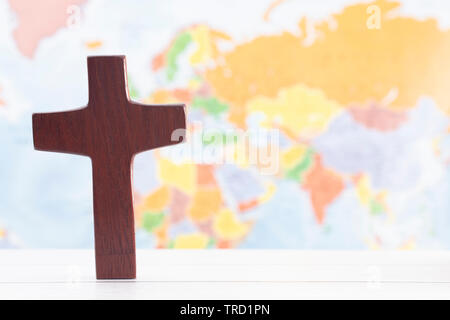 The Cross of Jesus Against the Background of a World Map Stock Photo ...