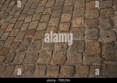 Close-up of street pavement made of stone blocks in Paris. One of the most impressive world’s cultural center in France. Stock Photo