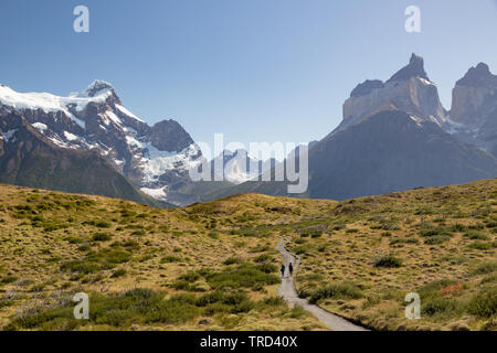 2 hikers on a trail in Torres del Paine, Patagonia, Chile Stock Photo